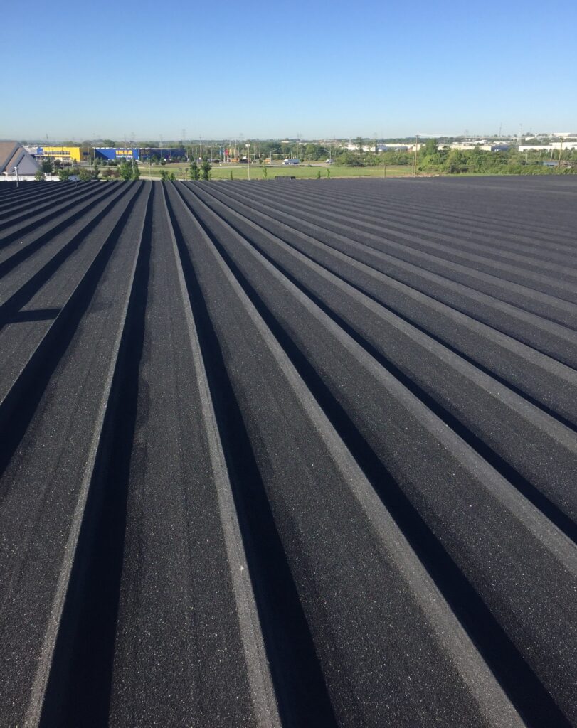 An industrial metal roof in OH gets repaired.